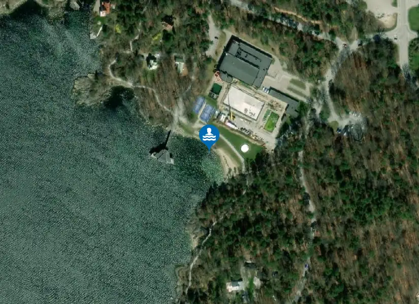 Vägga havsbad från satellit